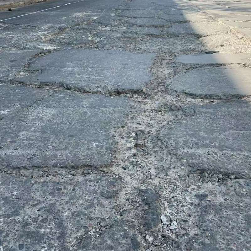 新津路面起砂露石子修补料